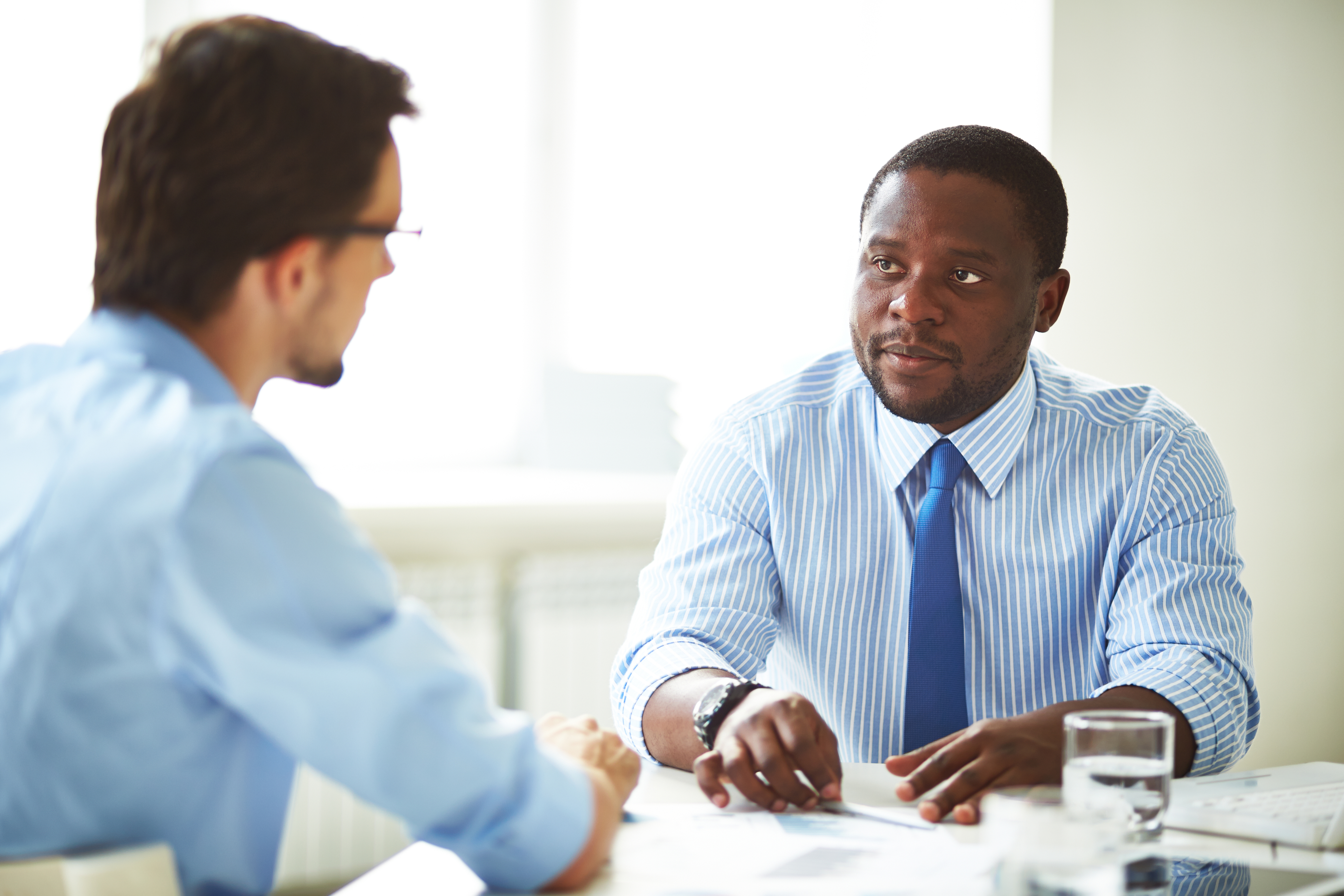 adult discussing autism in workplace